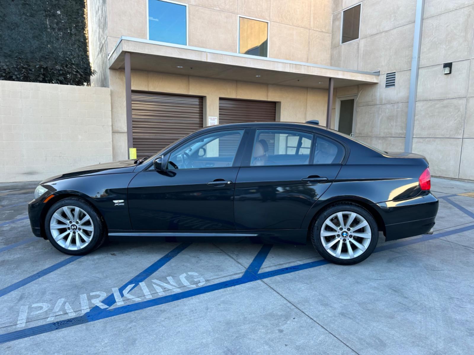 2011 /Tan BMW 3-Series 328i xDrive (WBAPK7C58BF) with an 3.0L L6 DOHC 24V engine, Automatic transmission, located at 30 S. Berkeley Avenue, Pasadena, CA, 91107, (626) 248-7567, 34.145447, -118.109398 - X Drive! South African Edition! Moon-roof! Leather! 2011 BMW 3-Series 328i xDrive - Luxury Meets Practicality in Pasadena, CA Dive into a realm where luxury and performance synchronize seamlessly. The 2011 BMW 3-Series 328i xDrive is not just a car; it's an experience. This model boasts BMW's - Photo #1